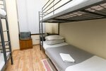 Кровать в общем 4-местном номере для мужчин и женщин в Хостел Ривьерский