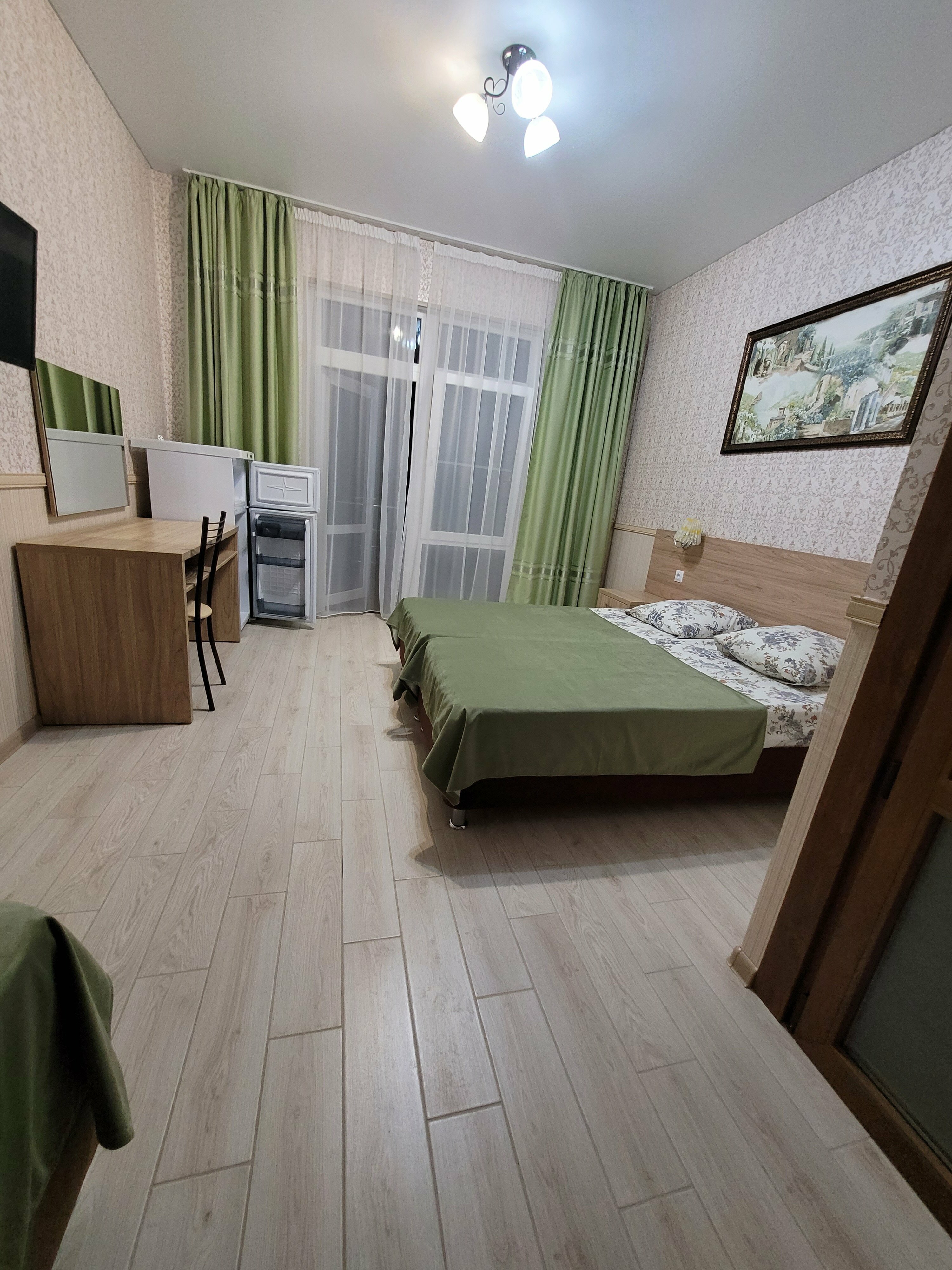 Трехместный номер с балконом