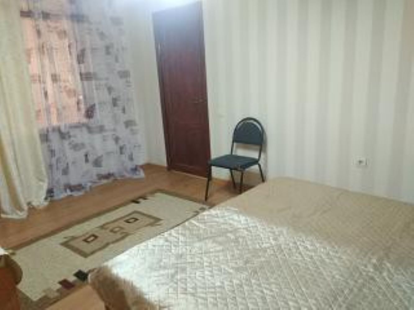 Четырехместный номер эконом-класса с общей ванной комнатой