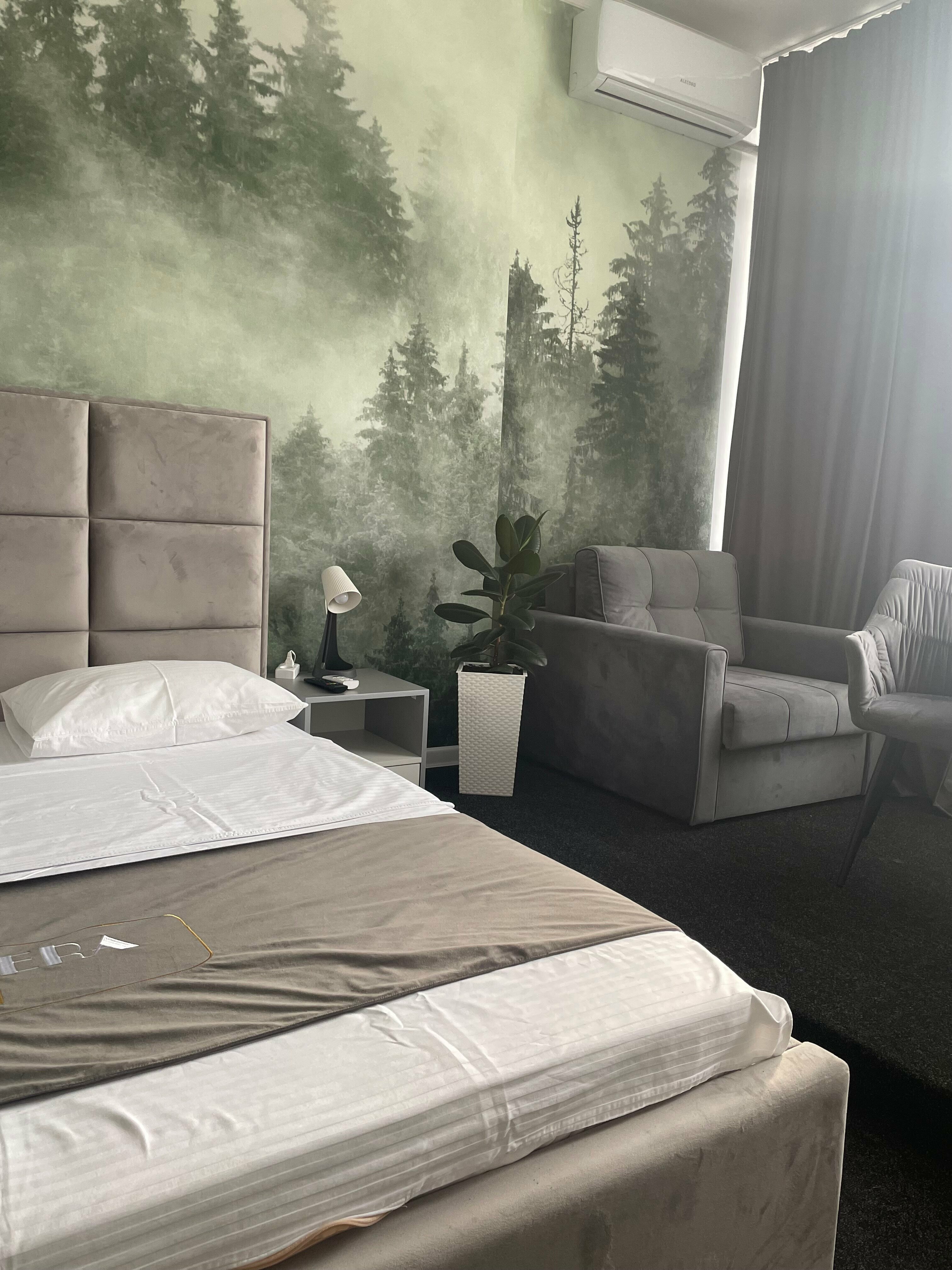 Трехместный номер Делюкс