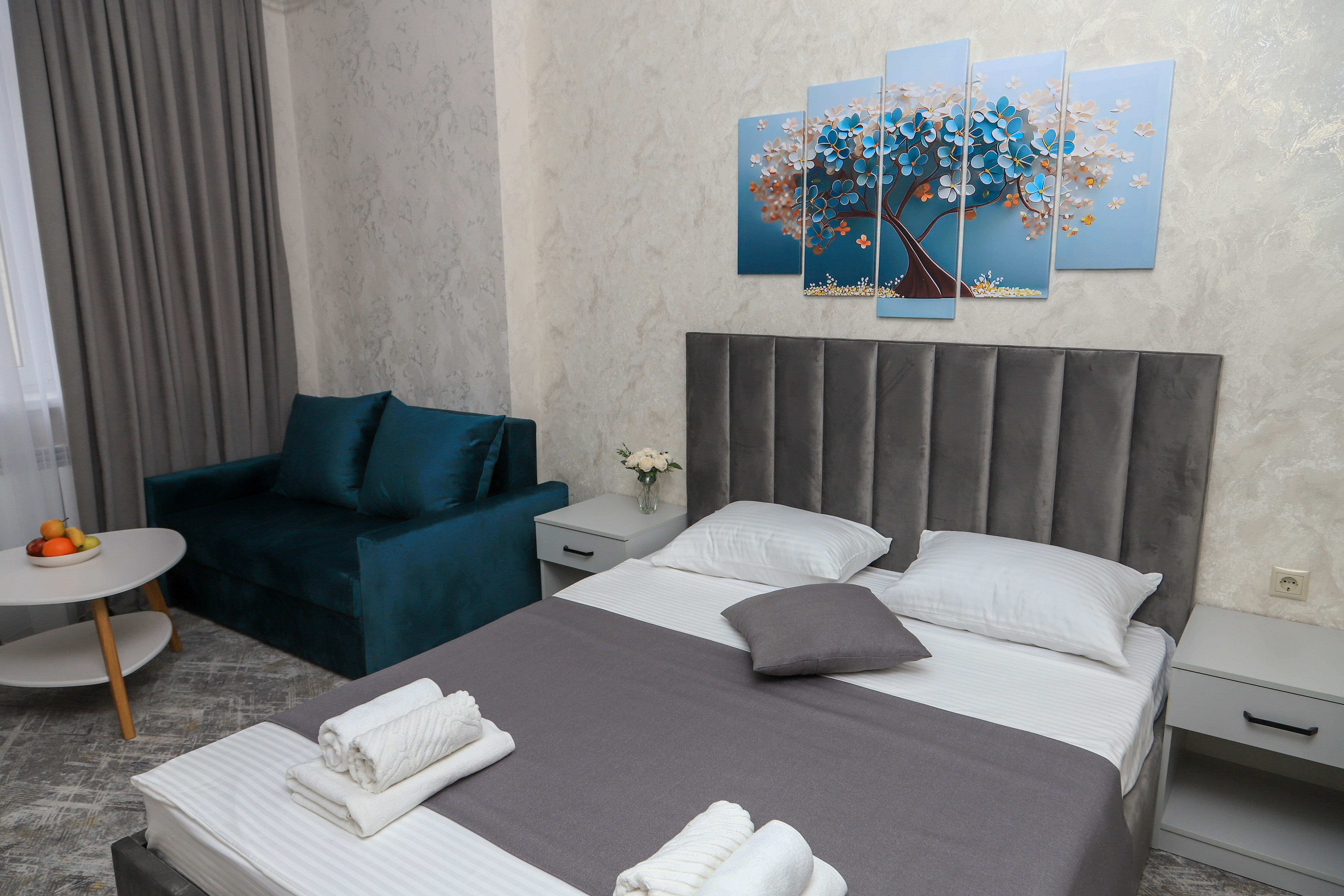 Трехместный номер Делюкс