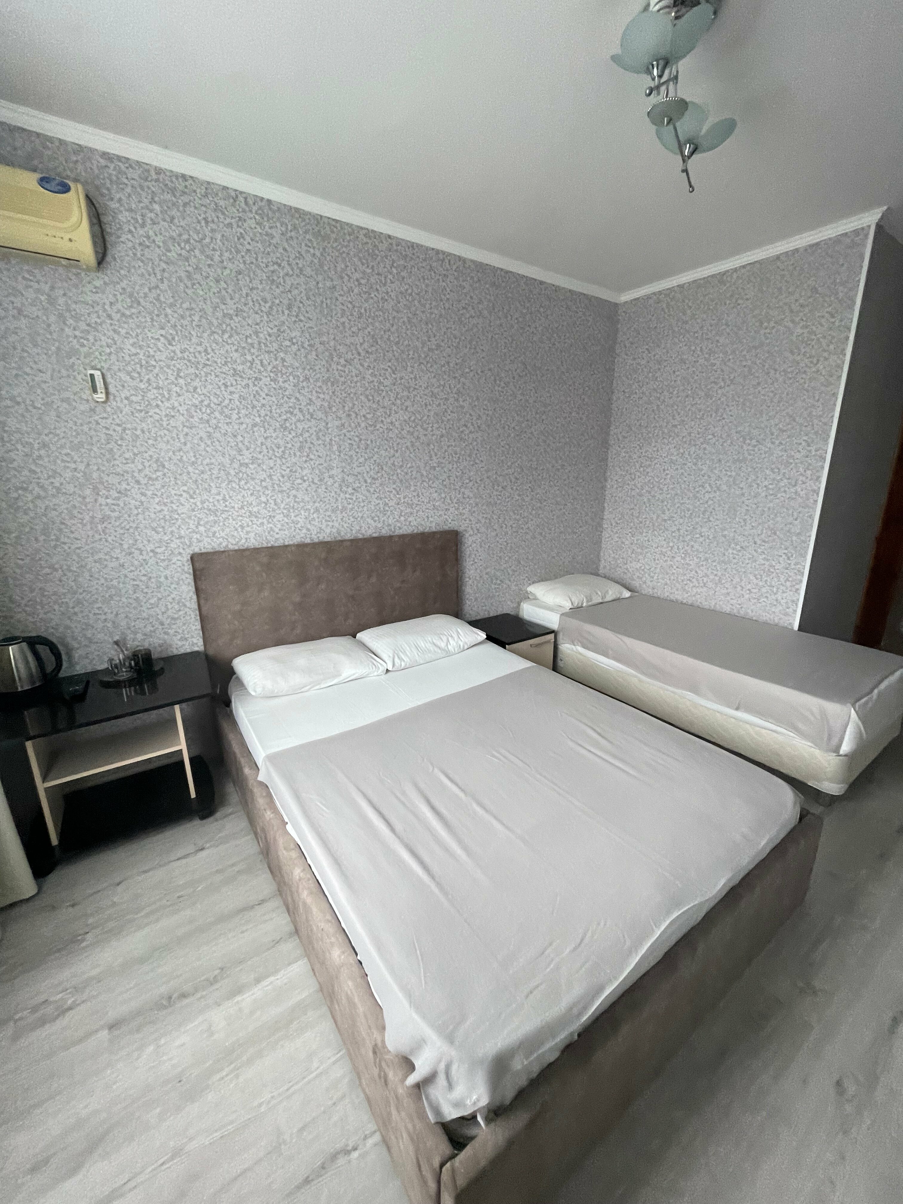 Трехместный номер с балконом