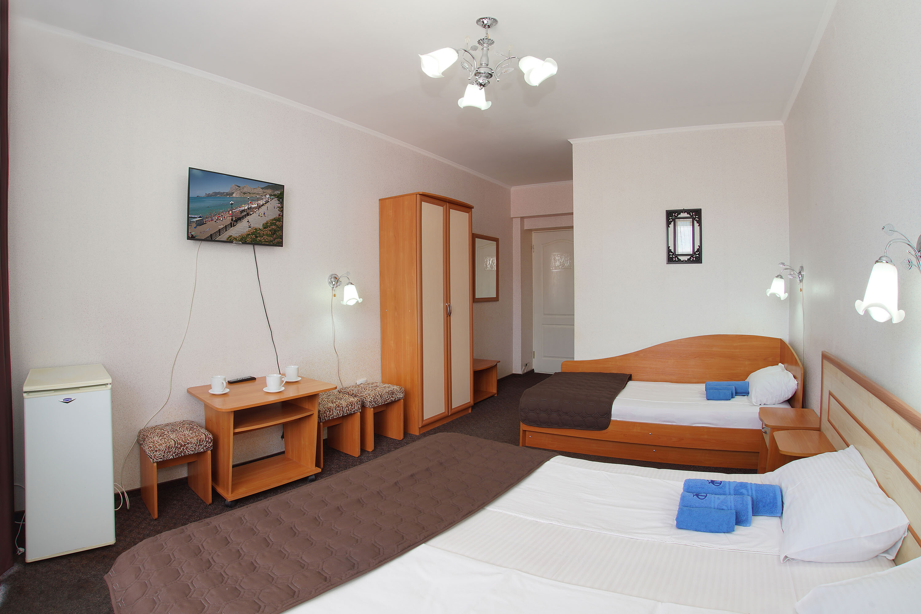 Трехместный номер с балконом