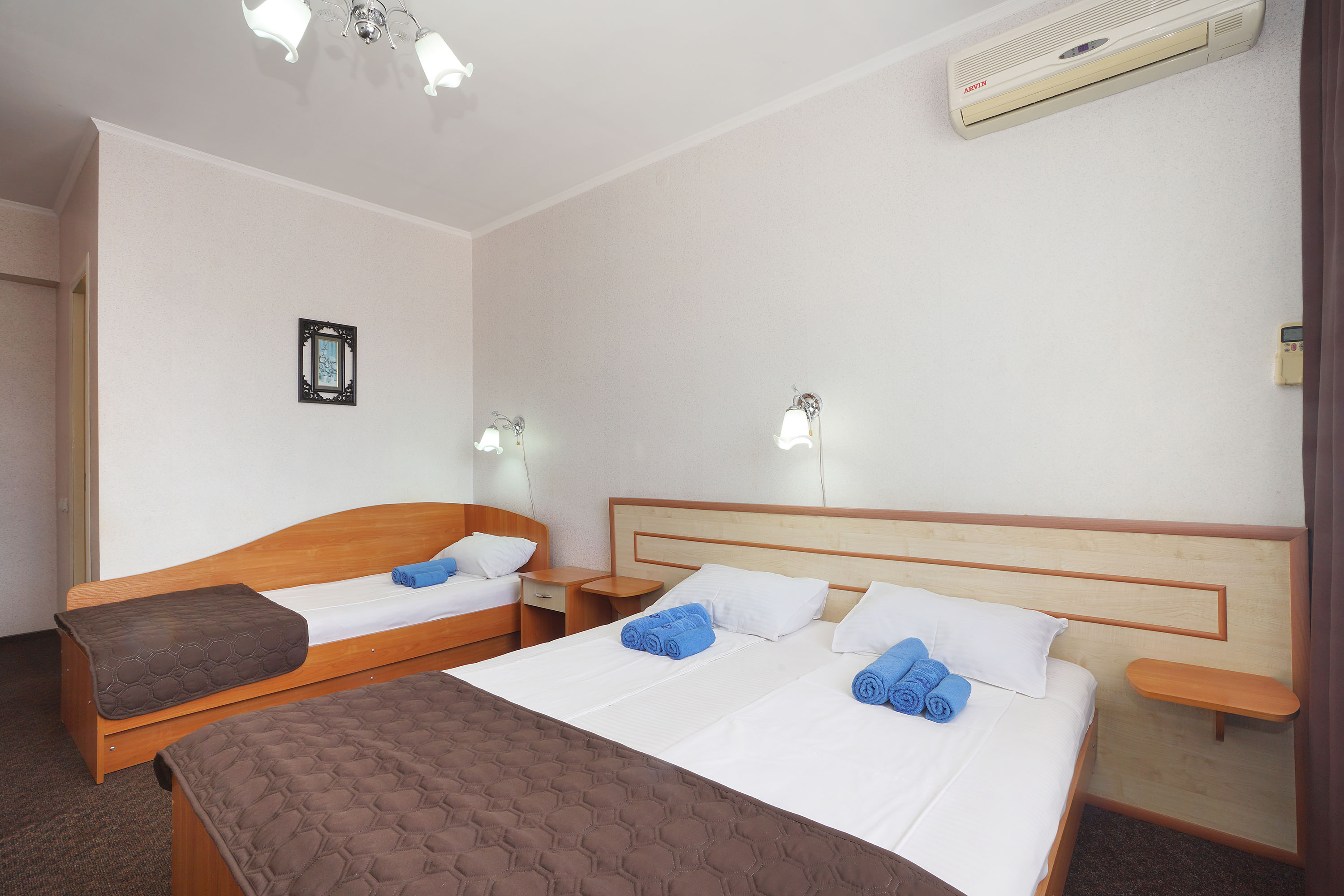 Трехместный номер с балконом