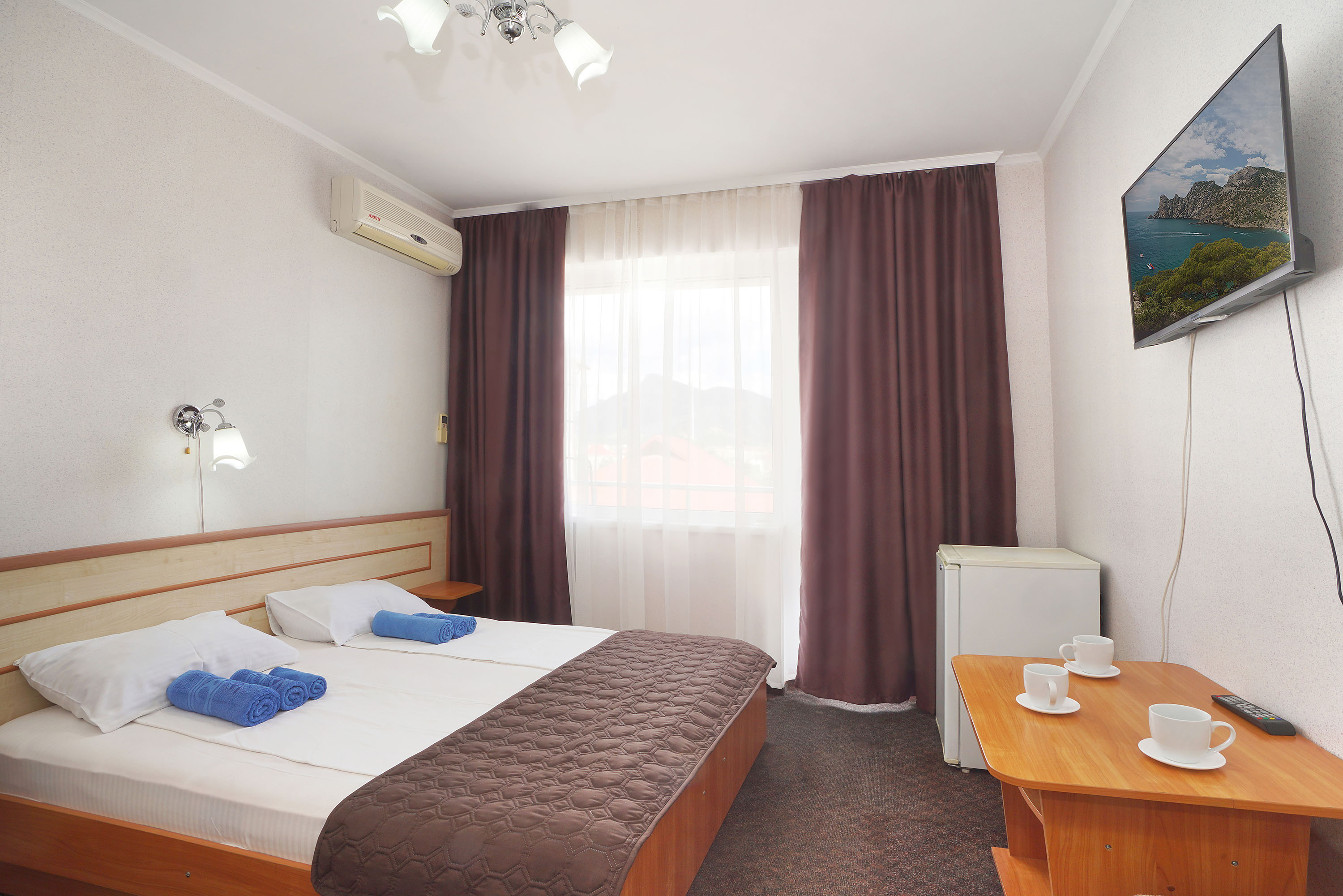 Трехместный номер с балконом