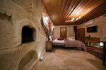 Deluxe Stone Room with Jacuzzi в Emit Cave Hotel