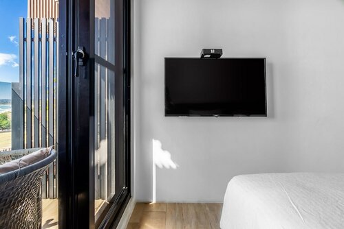 Улучшенный двухместный номер с 2 односпальными кроватями, балкон, вид на море в Kenting seawall Inn 112