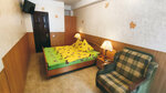 Двухместный номер с двуспальной кроватью и дополнительной кроватью в Жемчужина