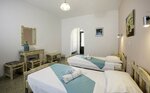 Номер с 2 односпальными кроватями в Kalathos Sun Hotel