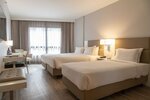 Quarto Superior Triplo Queen в Radisson Barra Rio De Janeiro