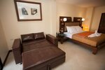 Люкс «Премиум», 1 двуспальная кровать «Кинг-сайз» с диваном-кроватью, ванна, вид на сад в Lotusland Resort