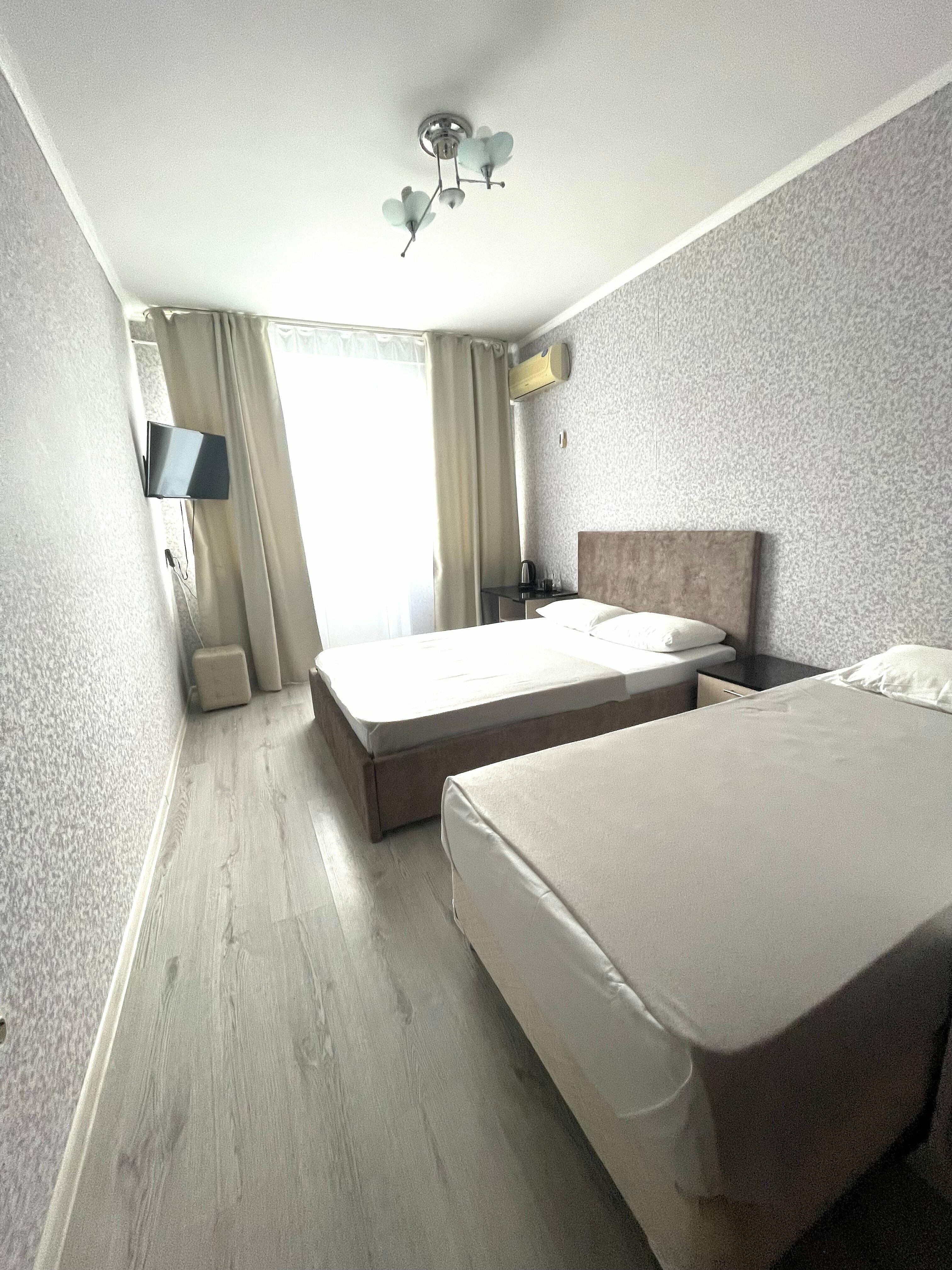 Трехместный номер с балконом