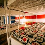 Кровать в 10-местном общем женском номере в Sky Hostel