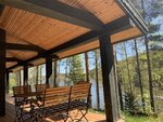 Зеленый дом на скале c видом на озеро и купелью на дровах в Forrest Lodge Karelia