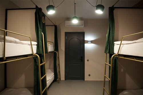 Кровать в общем 6-местном номере для мужчин и женщин в Guten Duck