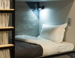 Спальное место 100/200 на 2 ярусной кровати в 10 местном общем номере для мужчин и женщин в VDali Poshtel