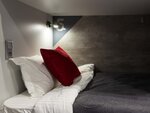 Спальное место 100/200 на 2 ярусной кровати в 8 местном общем номере для мужчин и женщин в VDali Poshtel