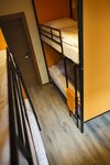 Кровать в общем 8 номере с кондиционером и бесплатный Wi-Fi. в Портал