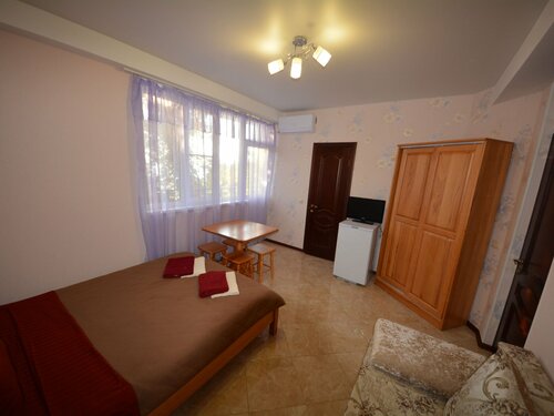 Трехместный номер с балконом