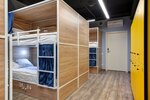 Кровать в 10-и местном общем номере в Roomy Hostel