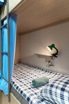 Кровать в общем 12-местном номере для мужчин и женщин в Френдс