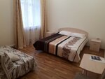Трехместный номер с двуспальной кроватью и дополнительной односпальной кроватью в Парнас