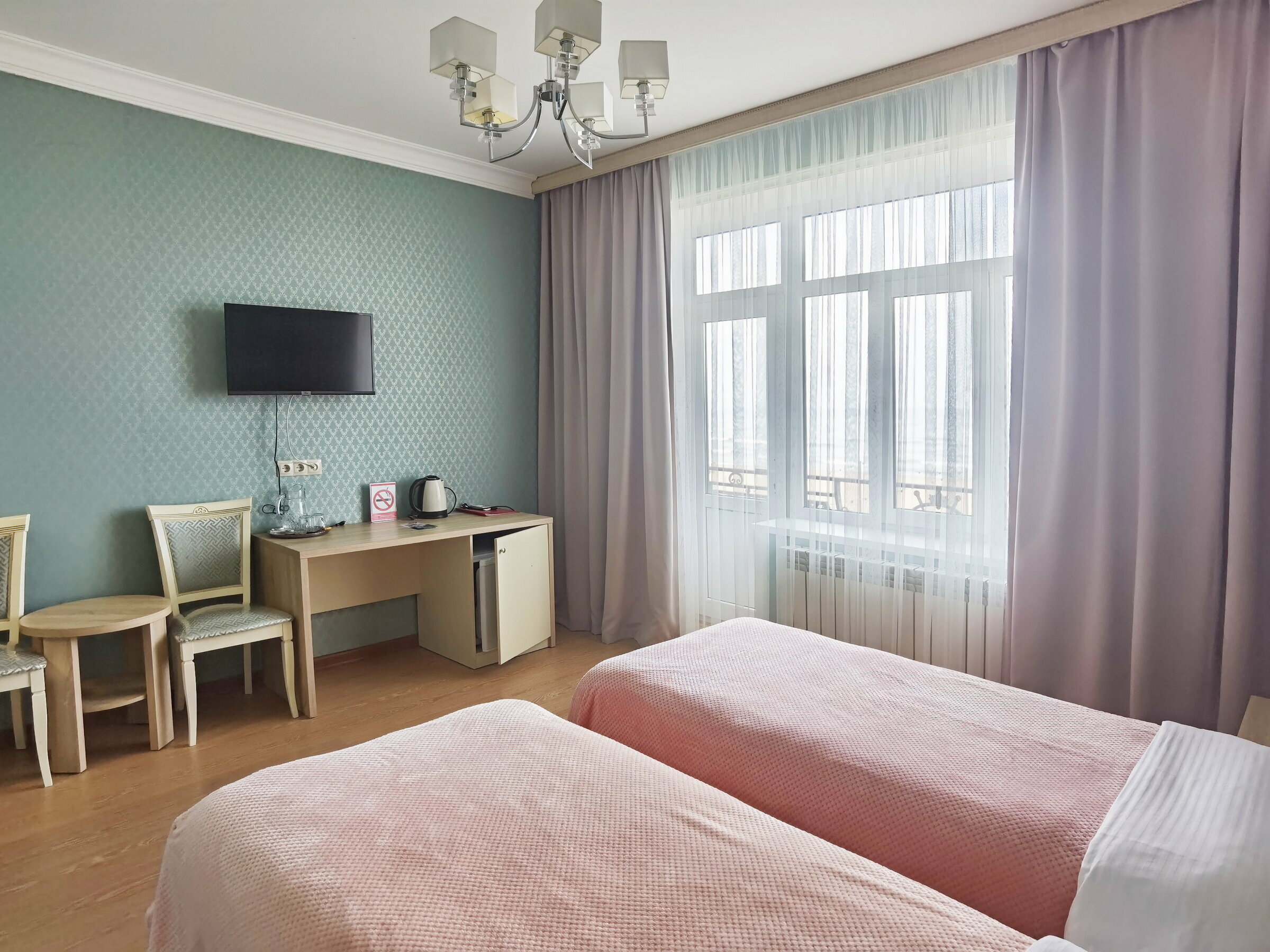 Улучшенный двухместный номер с 2 отдельными кроватями, вид на море