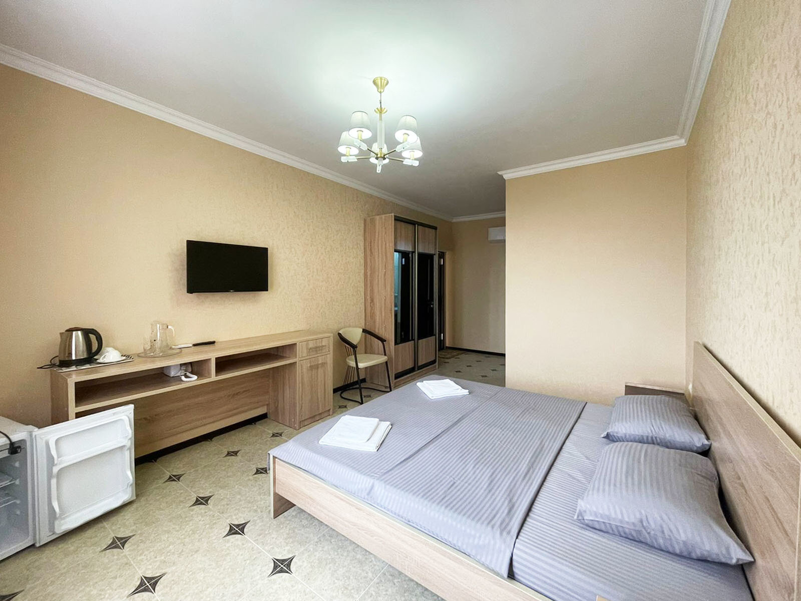 Улучшенный номер с кроватью размера «queen-size»