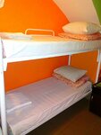 Кровать в общем 6-местном номере для мужчин и женщин в Хостел в центре Петербурга