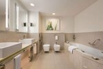 Двухместный люкс Deluxe 2 отдельные кровати в Traders Hotel, Qaryat Al Beri, Abu Dhabi