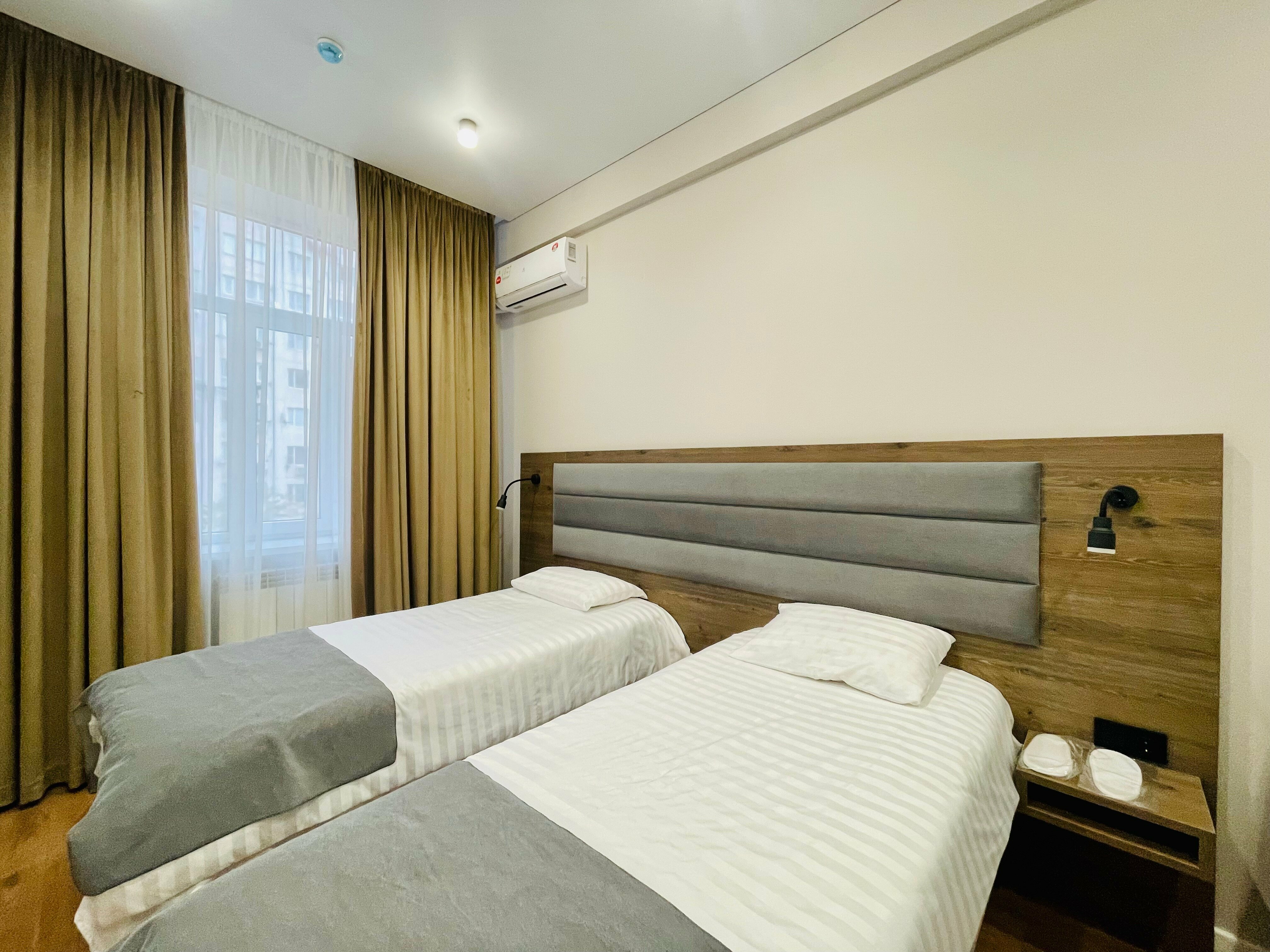 Двухместный номер с 2 отдельными кроватями