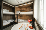 Кровать в общем 4-местном номере для мужчин и женщин в Континент