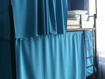 Кровать в общем 8-местном номере для мужчин и женщин в Travel Inn на Добрынинской