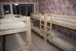 Спальное место на двухъярусной кровати в общем номере для мужчин в Северный Мишка
