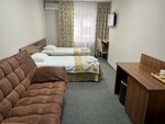 Двухместный номер с 2 отдельными кроватями и общей ванной комнатой в Жили-были