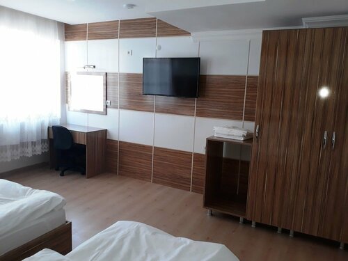 Четырёхместный номер Comfort в Dilmac Hotel