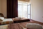 стандарт с балконом 2 односпальные кровати в Марити