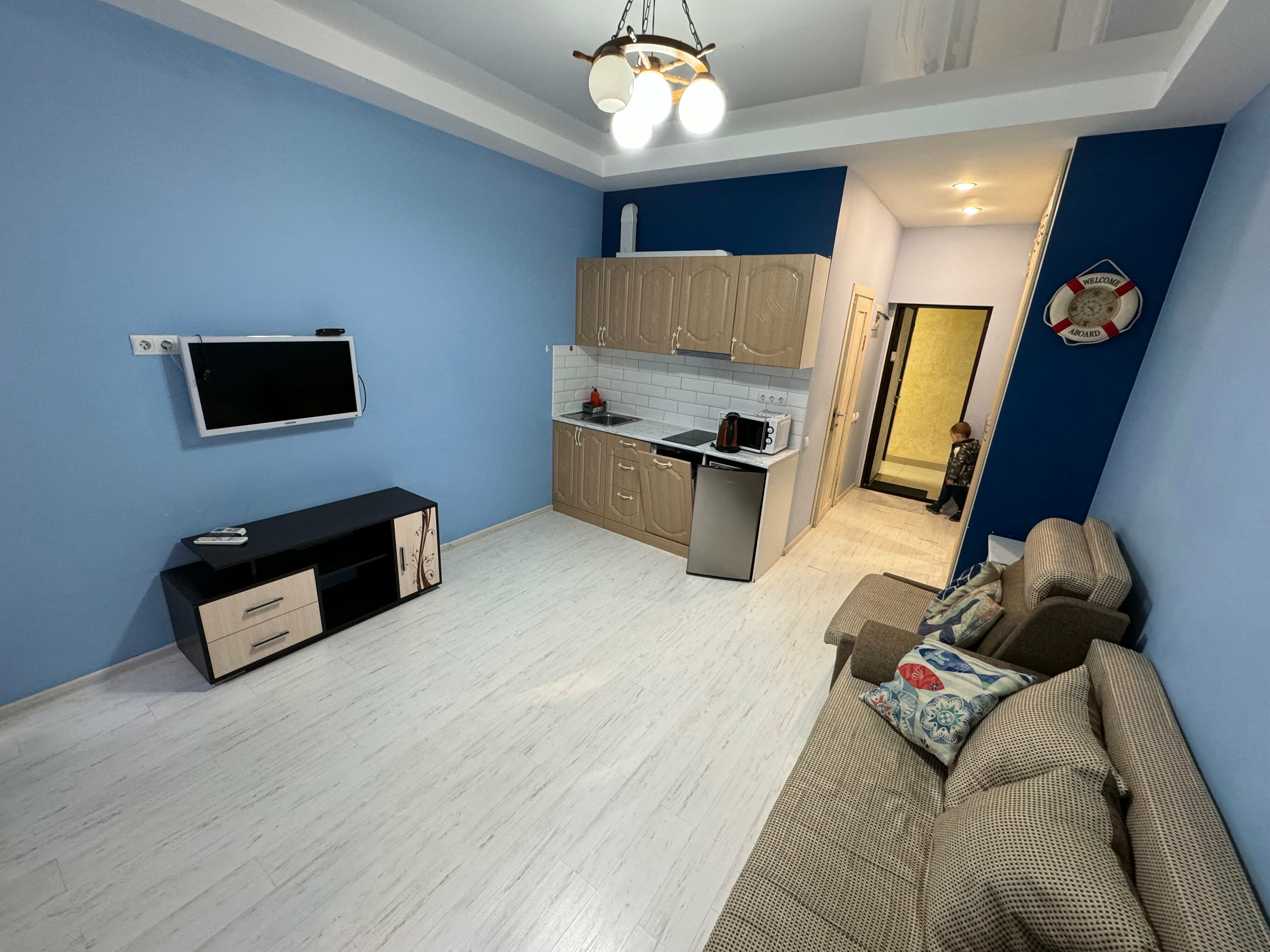 Трехместный номер с балконом