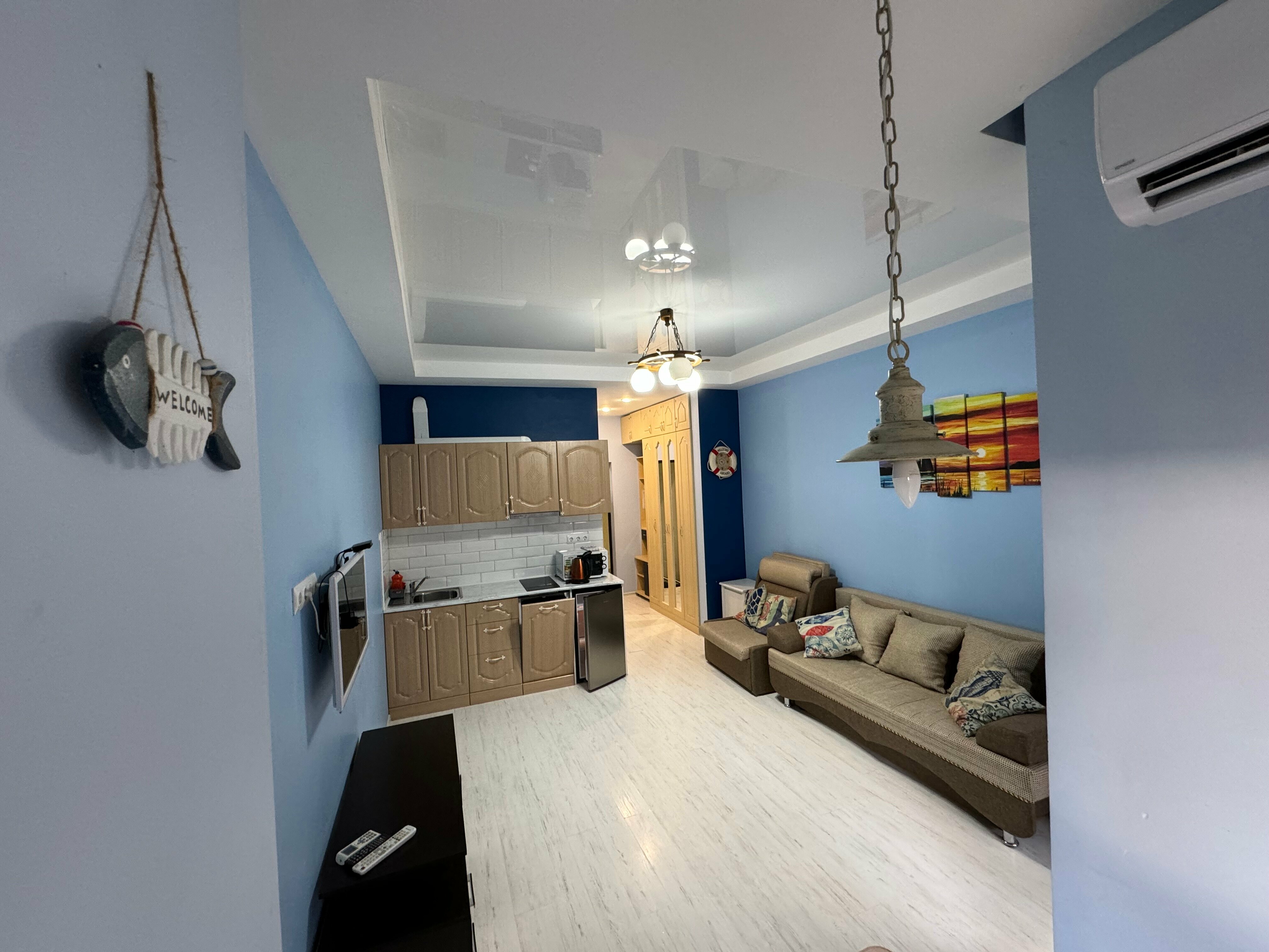 Трехместный номер с балконом