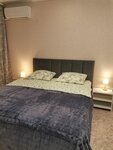 Четырехместный номер с балконом в Apartments Green City