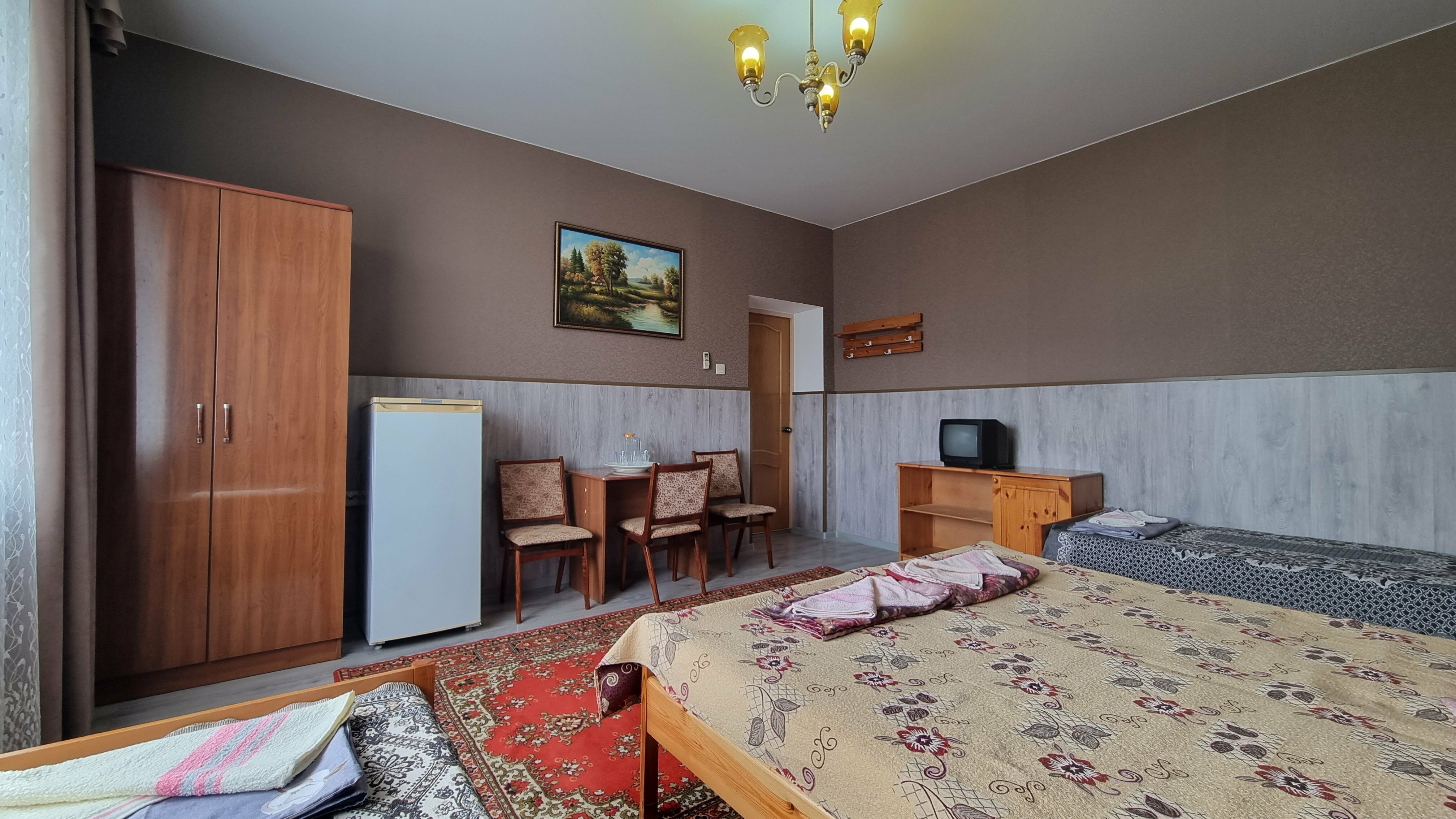 Улучшенный четырехместный номер