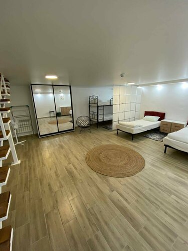 Двухуровневый четырехместный номер в Арт-Отель