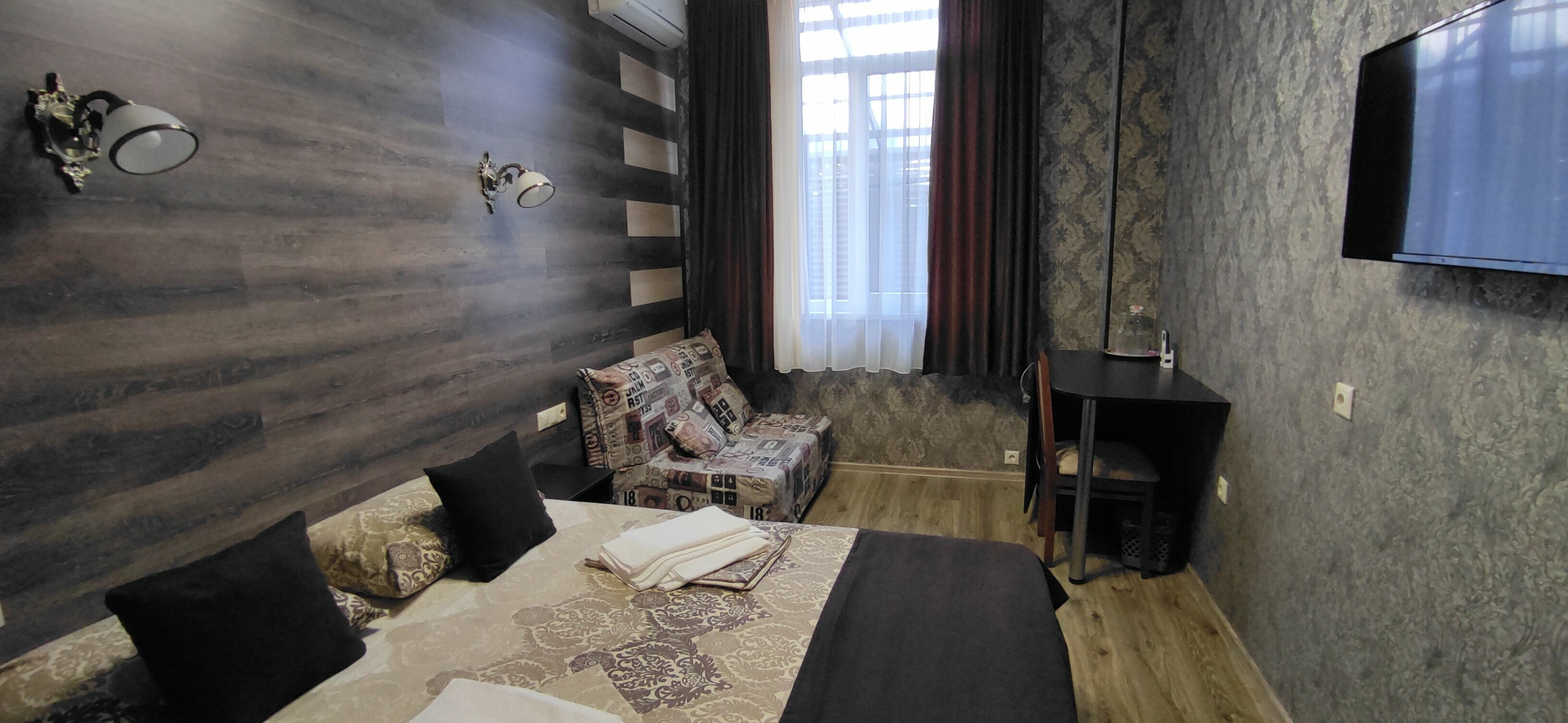 Трехместный номер Делюкс