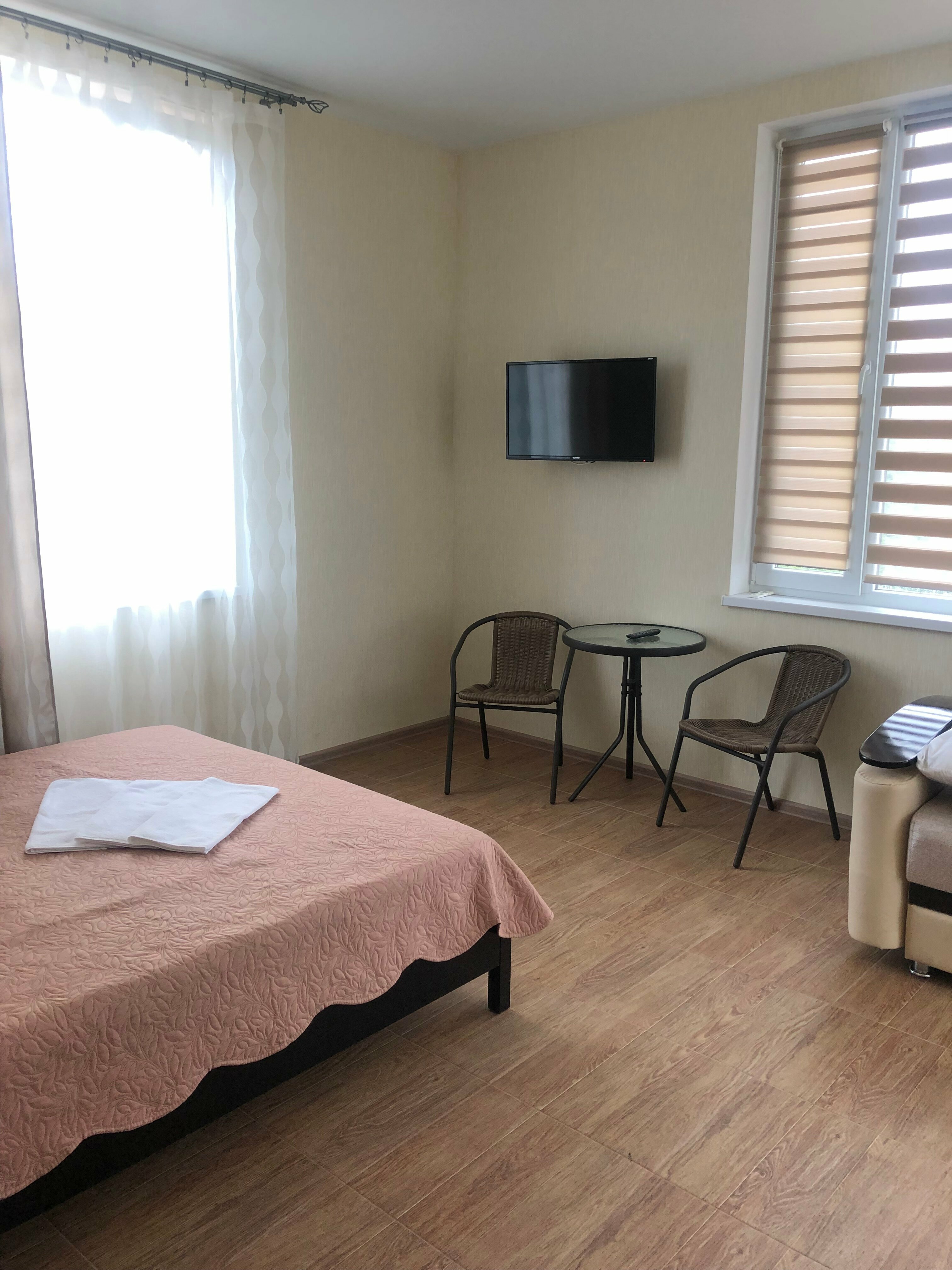 Трехместный номер с балконом