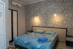 Двухместный номер с 1 кроватью или 2 отдельными кроватями и собственной ванной комнатой в Гостевой Дом Малина