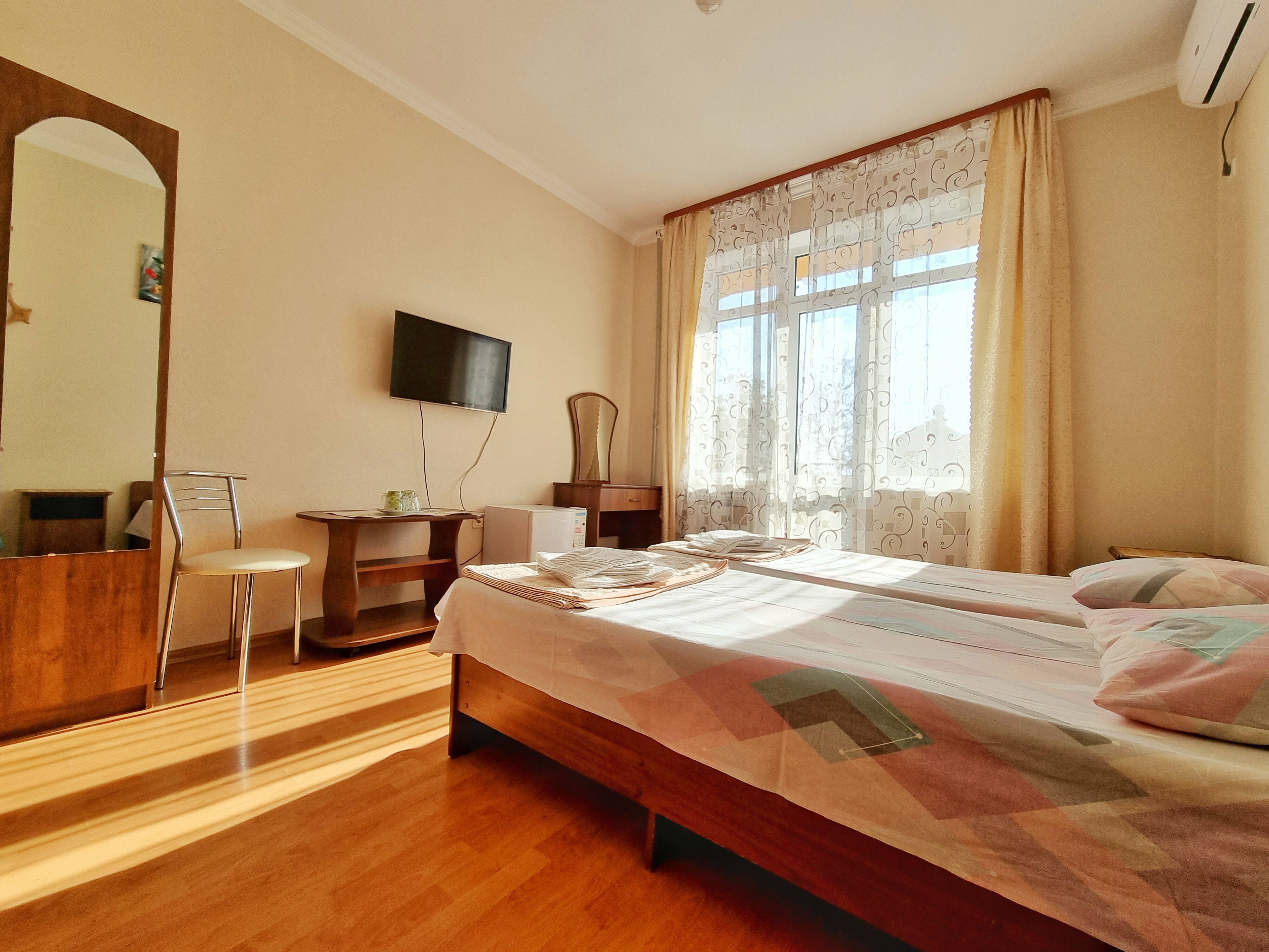 Двухместный номер с 2 отдельными кроватями и балконом