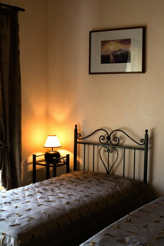 Стандартный номер с 2 односпальными кроватями и диваном в Гостевой Дом Орлиное