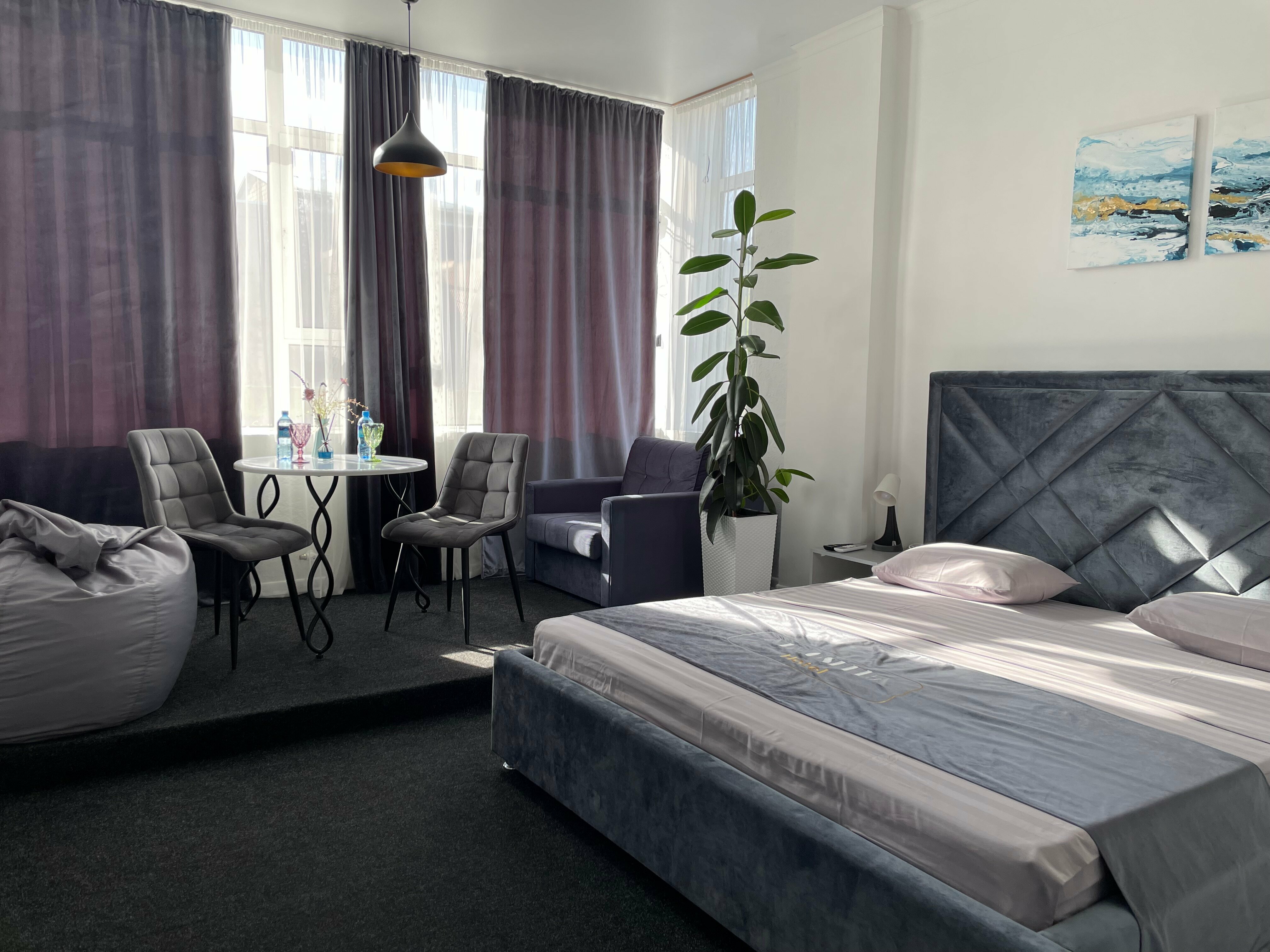 Трехместный номер Делюкс