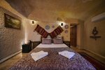 Deluxe Double Cave Room with Jacuzzi в Emit Cave Hotel