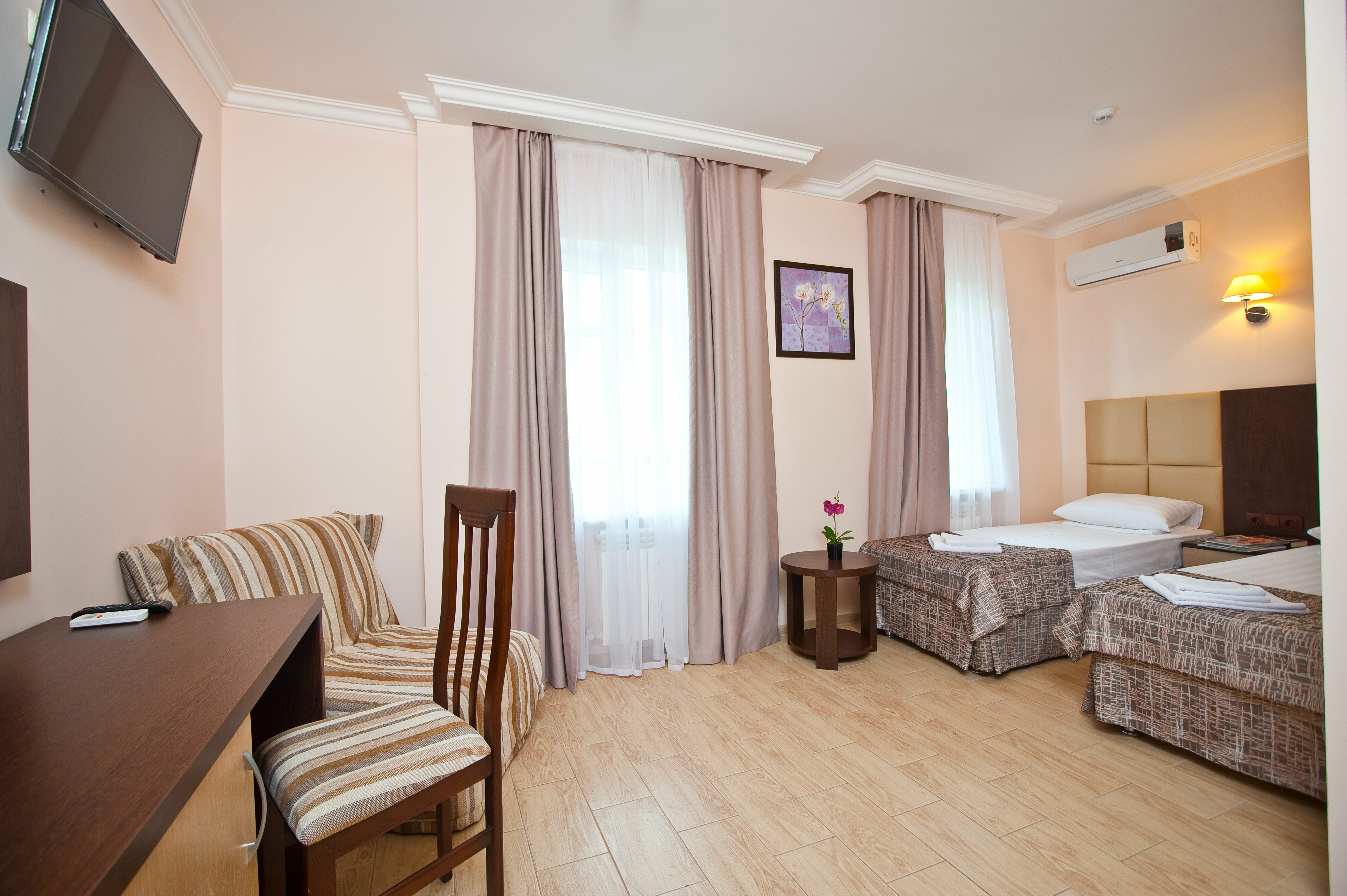 Трехместный номер с балконом